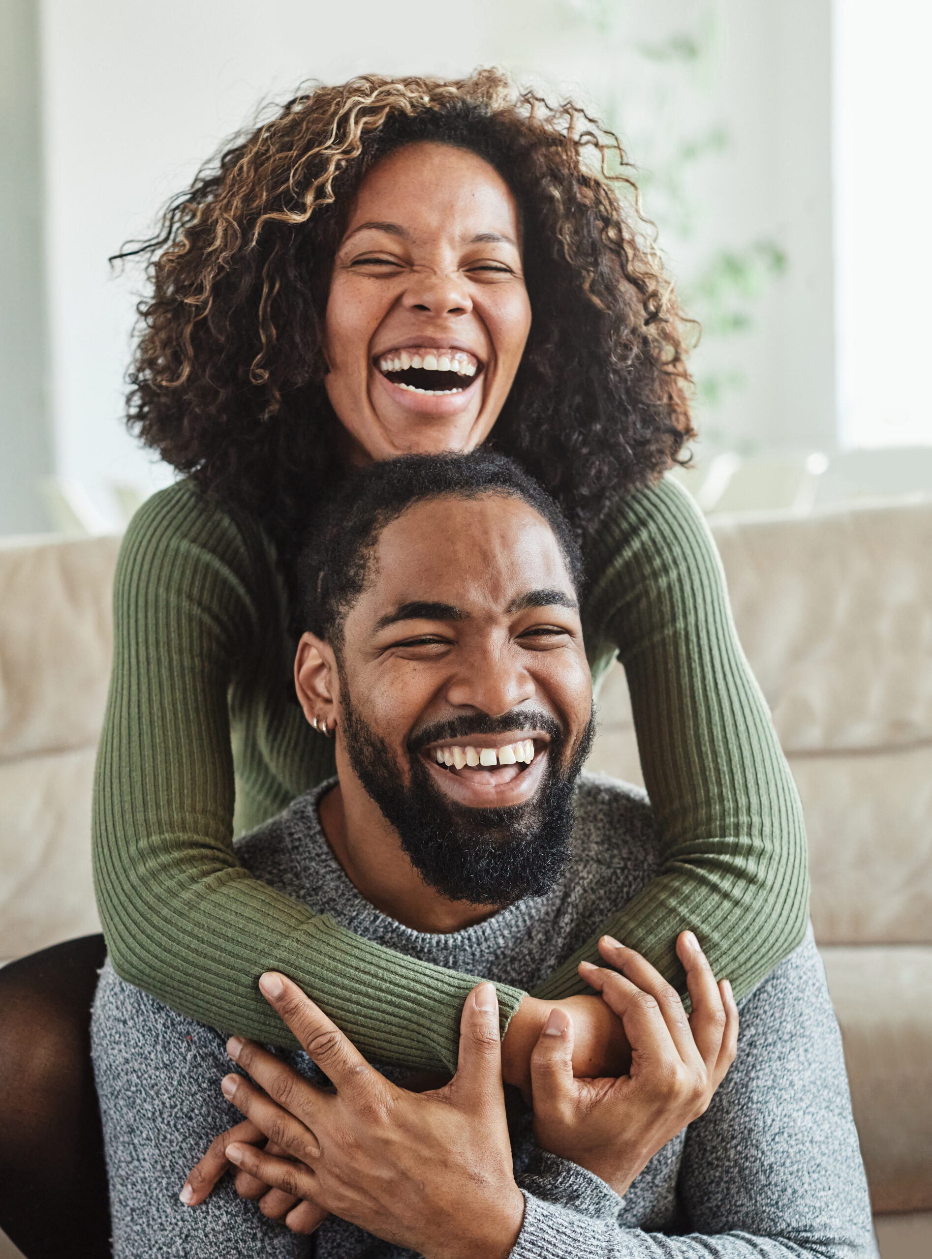 woman couple man happy happiness love black young lifestyle together romantic boyfriend girlfriend laughing hug